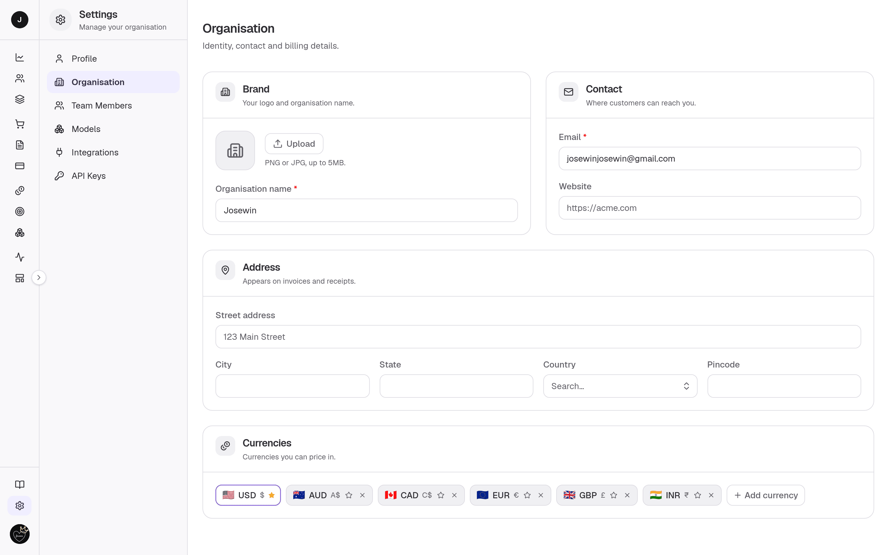 Organisation settings — the Brand, Contact, Address, and Currencies sections with the sticky unsaved-changes save bar. (Authenticated screen — sign in at payments.clocknext.com to view.)